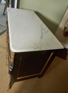 Pair of French Regence Style Ormolu-Mounted Ebonized Chest of Drawers