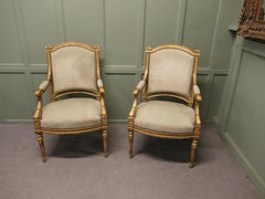 A Pair of French Regency Style Open Arm Chairs These large arm chairs are very