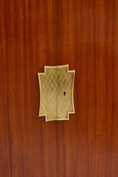 Pair of French Ribbon Mahogany Cabinets with Brass Hardware