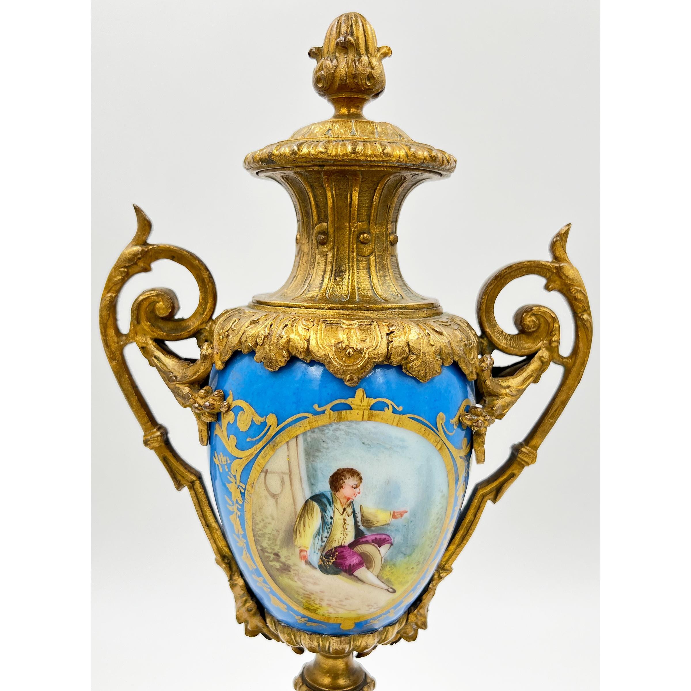 19th Century A Pair Of French Sevres Style Porcelain Urns, With Gilt Bronze Mounts For Sale