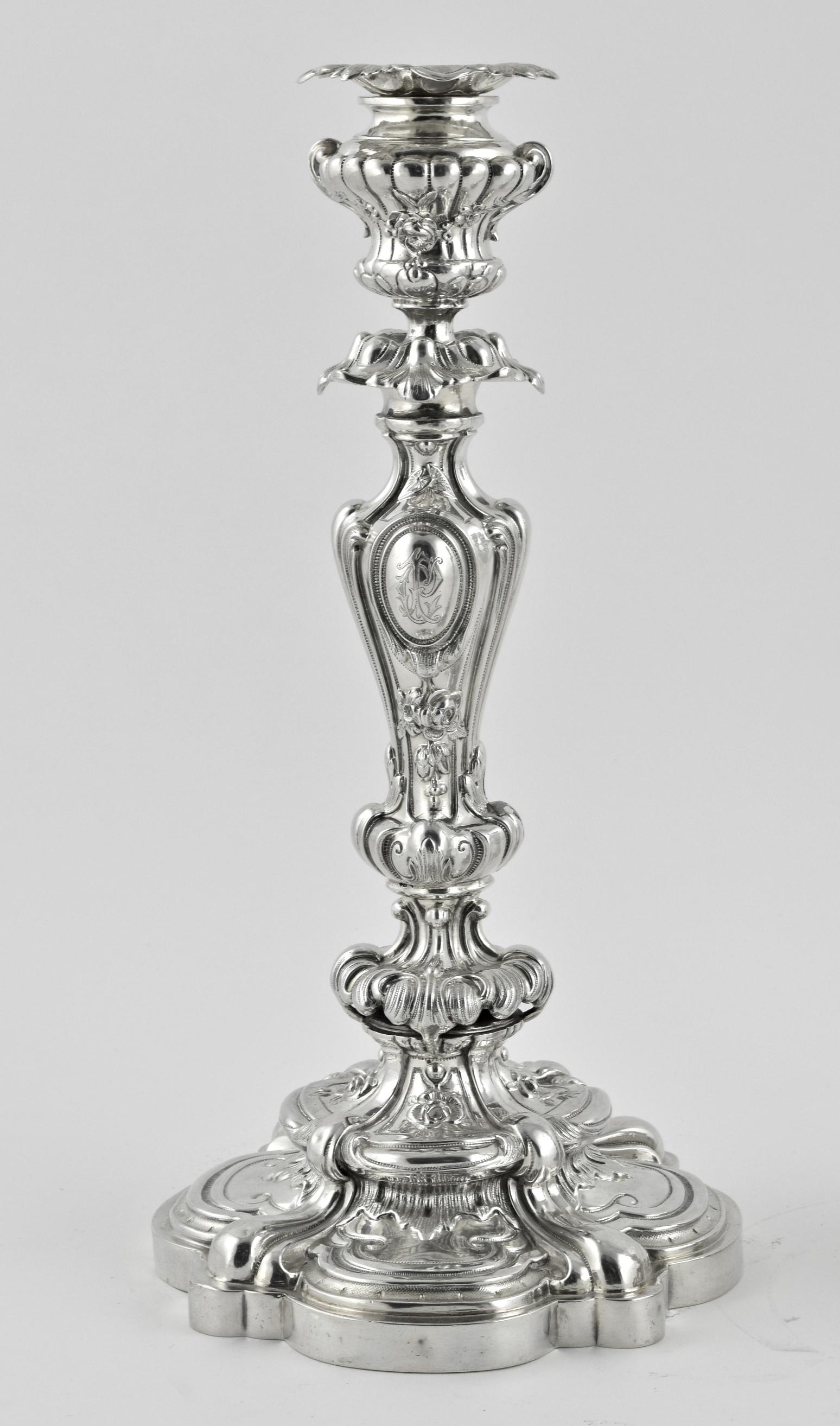 Heavily decorated with flowers and foliage, each engraved with an initial. Removable original nozzels. Minerva mark for French silver