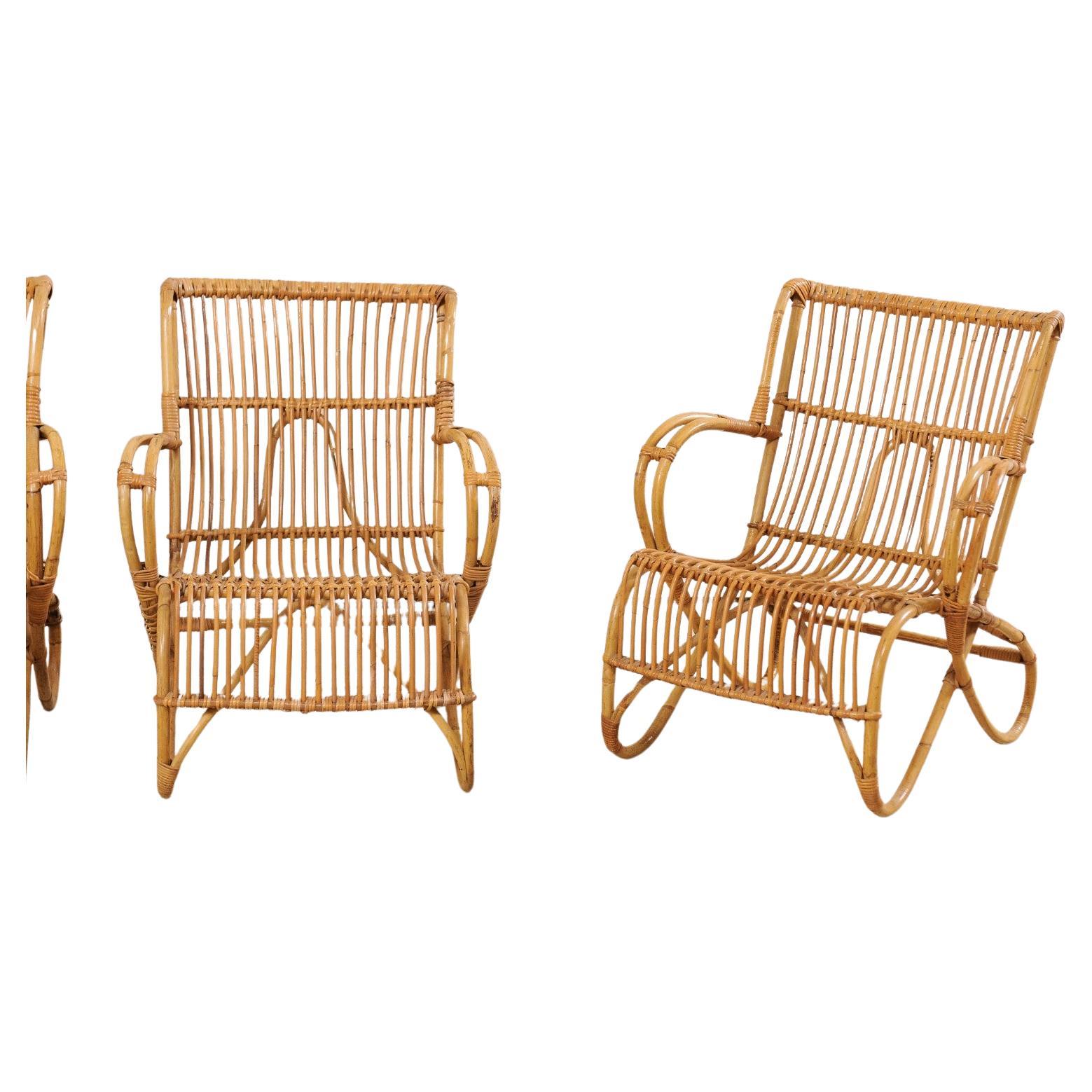 A Pair of French Vintage Bent Cane Patio Chairs with Fluid Shapes