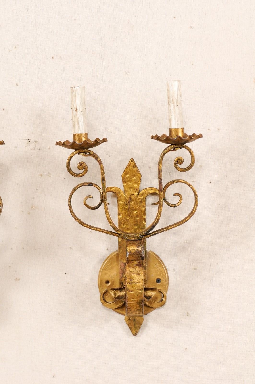 20th Century Pair of French Vintage Fleur-de-lys Gold Tone Iron Scroll Sconces For Sale