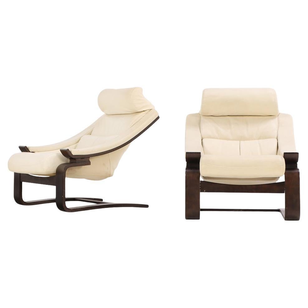 A Pair of French White Leather Cantilevered Lounge Chairs, C. 1970, Labeled Roch