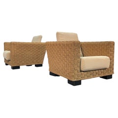 a pair of French, woven Hemp, Mid-Century, armchairs Audoux et Minet (style)