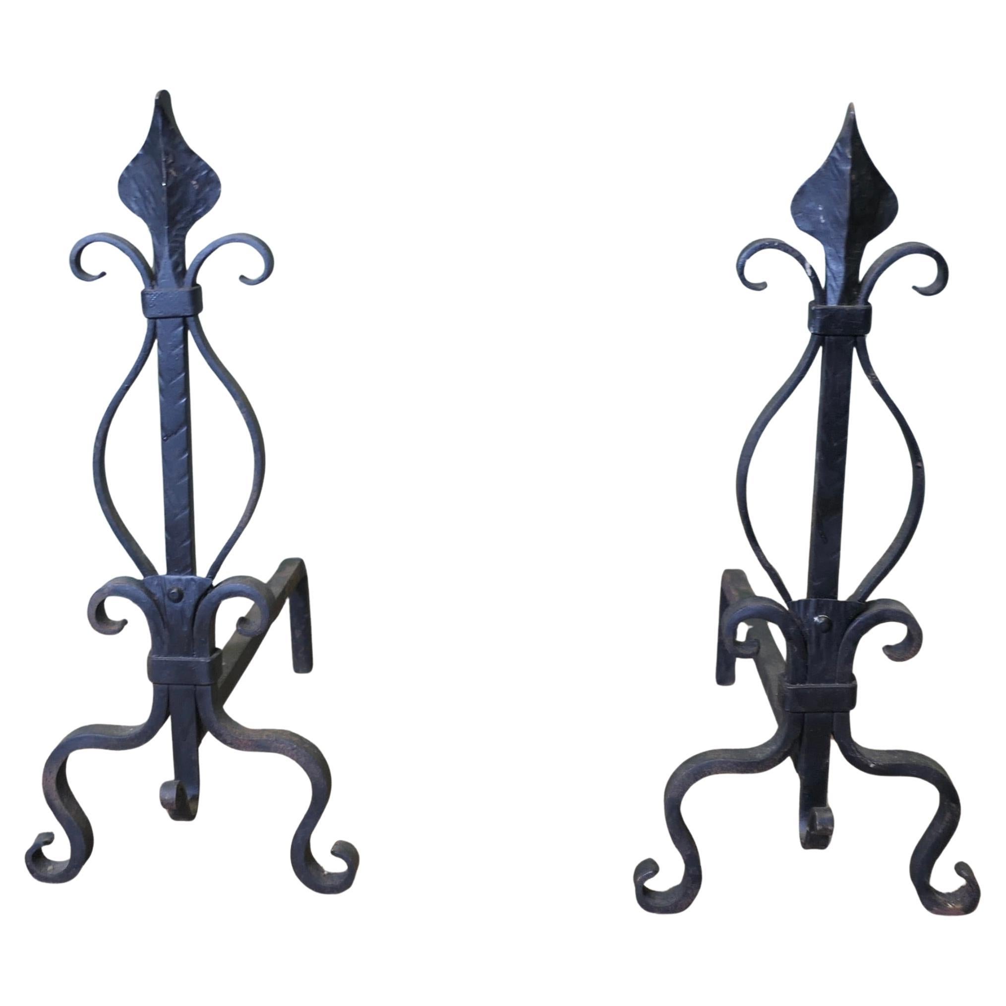 A Pair of French Wrought Iron Andirons or Fire Dogs For Sale