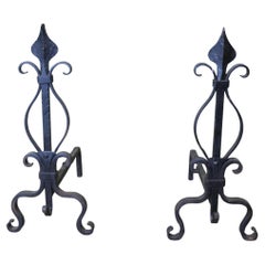 A Pair of French Wrought Iron Andirons or Fire Dogs