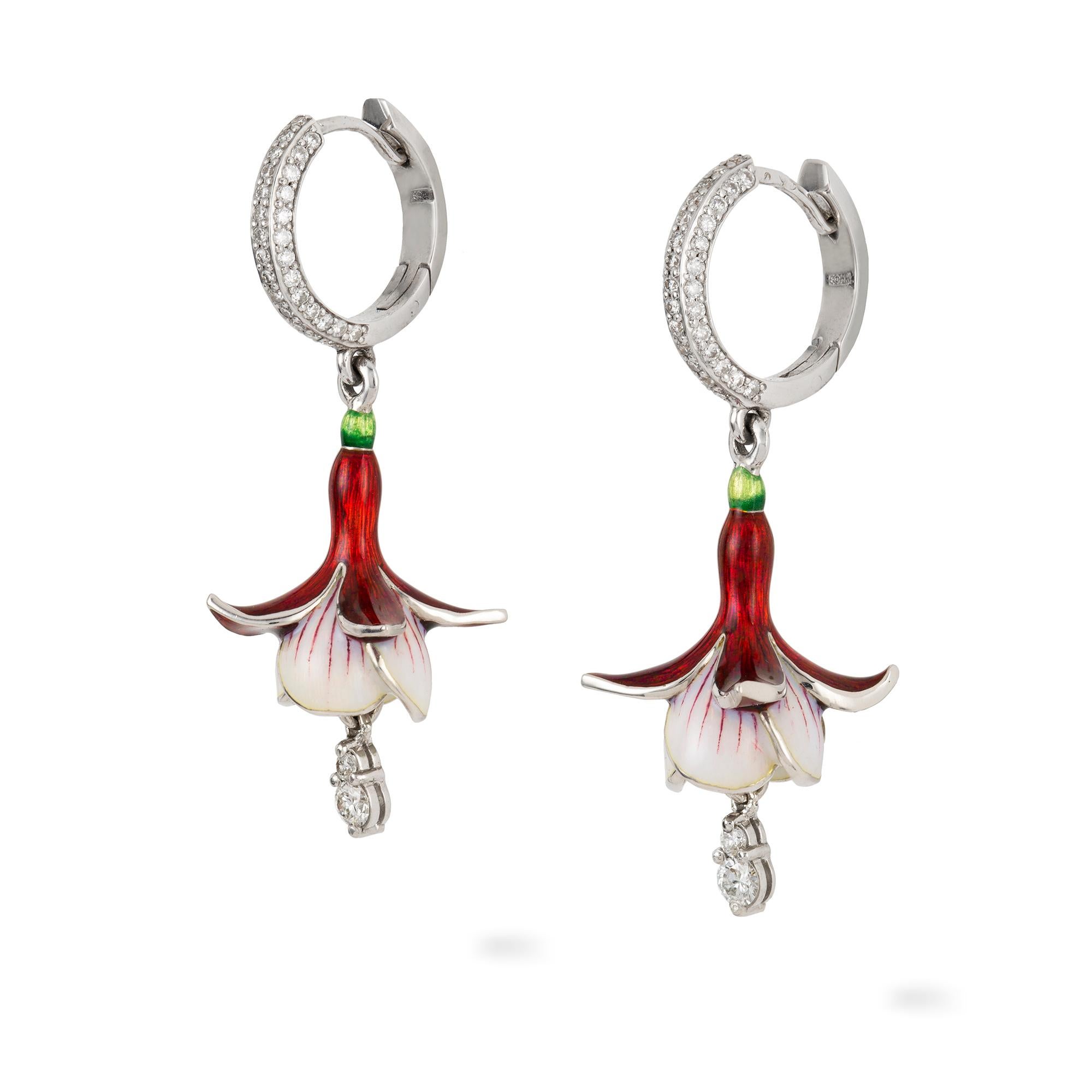 A pair of fuchsia earrings by Ilgiz F, each with a diamond-set hoop suspending a realistically carved champlevé enamelled fuchsia, with a diamond-set drop, the diamonds weighing 0.67 carats in total, all in white gold mount made by Ilgiz
