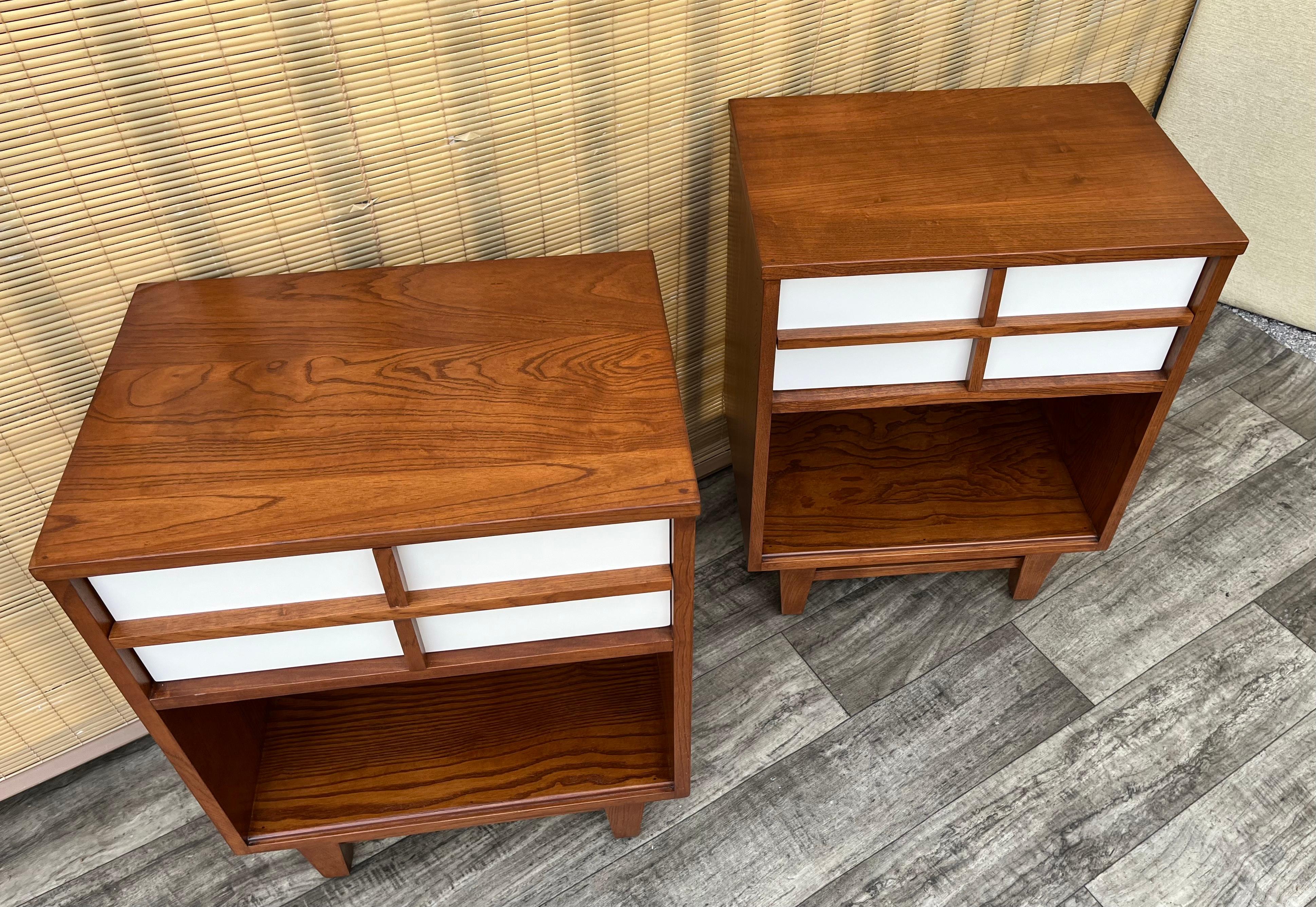 Mid-Century Modern A Pair of Fully Refinished Mid Century Modern Nightstands. Circa 1960s For Sale