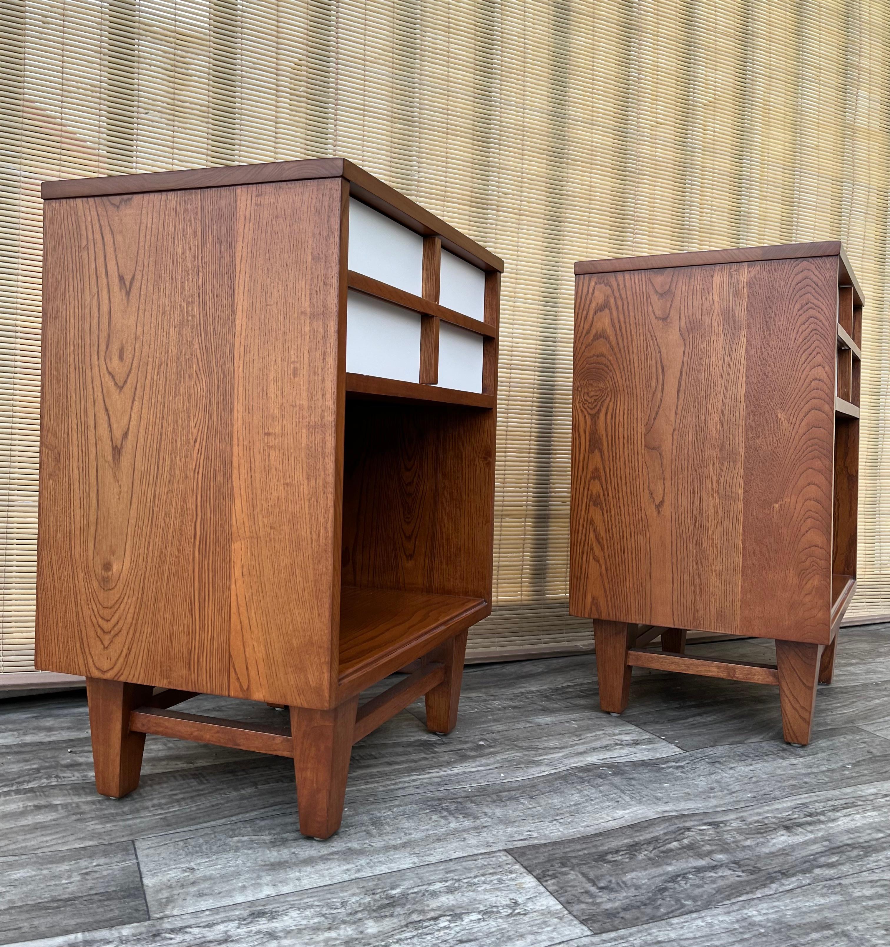 American A Pair of Fully Refinished Mid Century Modern Nightstands. Circa 1960s For Sale