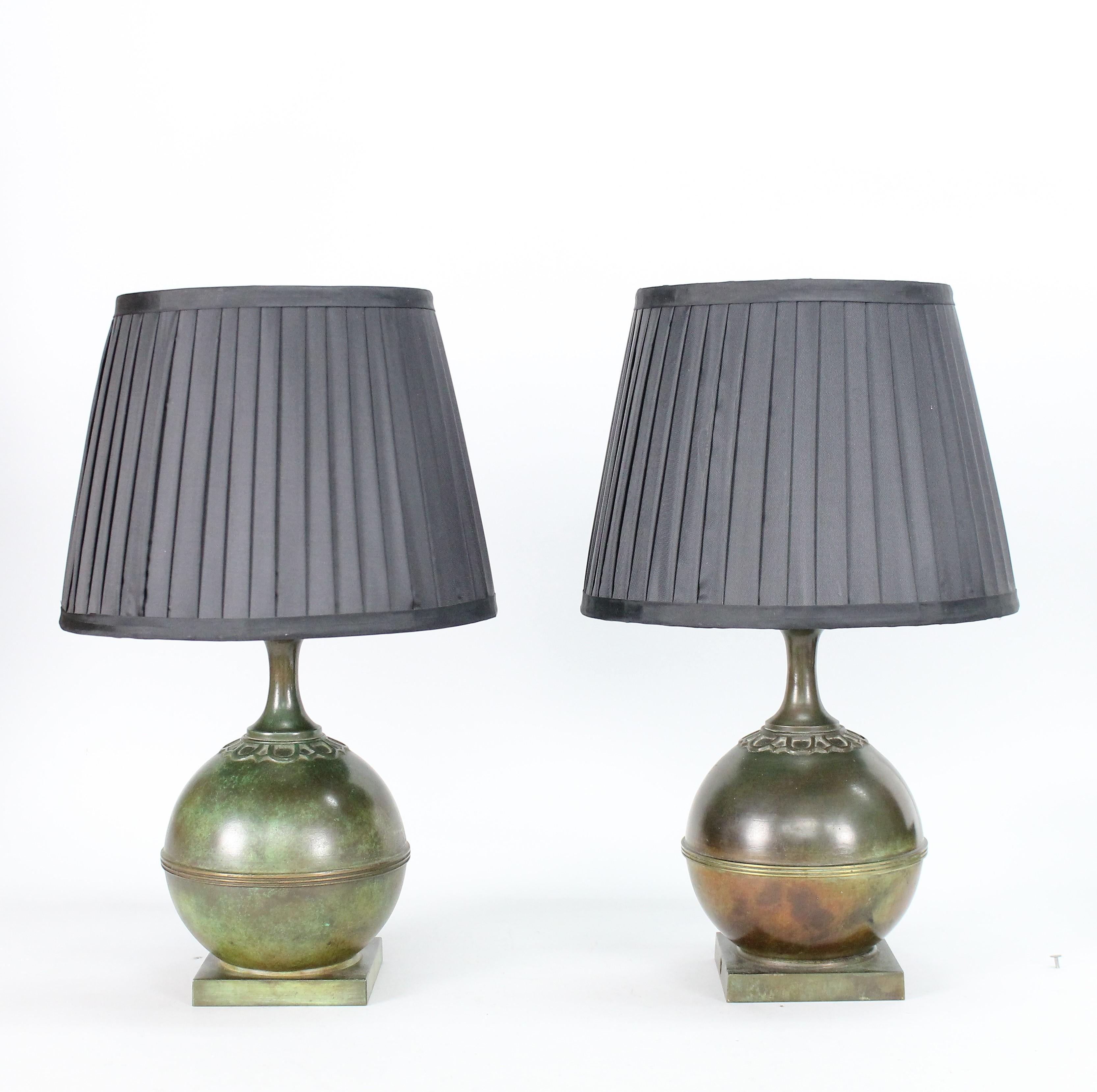 A great pair of green/brown bronze patinated 1930s table lamps.
Made by Guldsmedsaktiebolaget (GAB) in Stockholm Sweden.
In full working order and wired with European electrical standard.

There are of course some minor insignificant differences