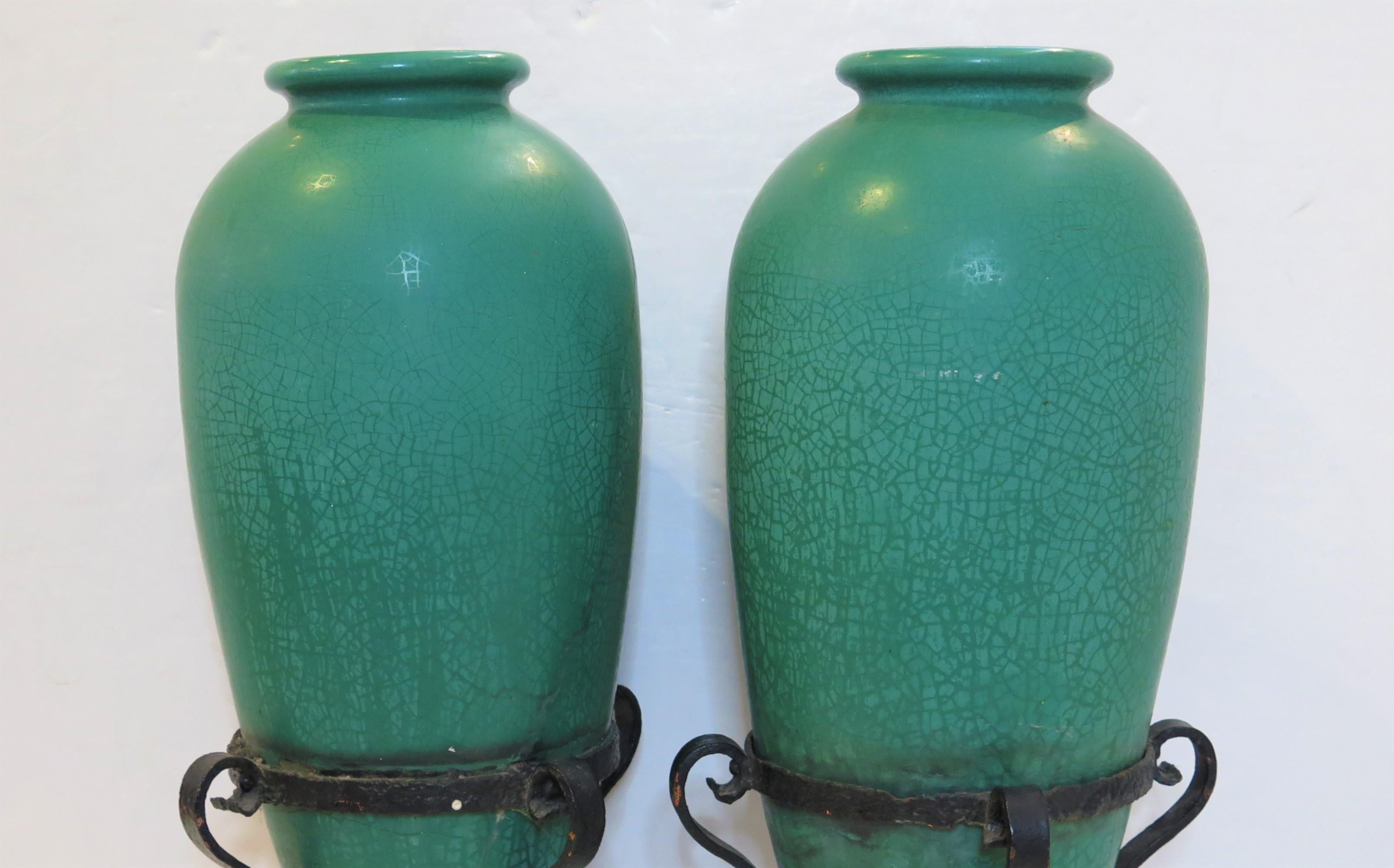 Arts and Crafts A Pair of Galloway Pottery Crackled Glaze Urns with Iron Stands