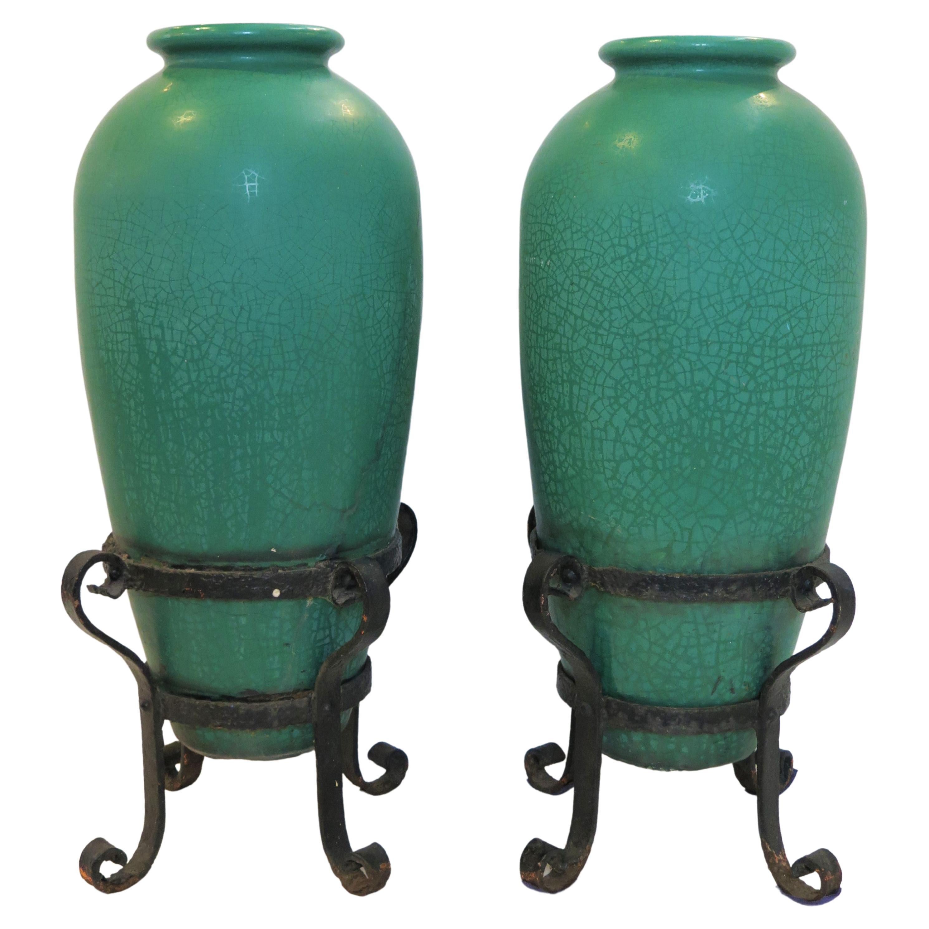 A Pair of Galloway Pottery Crackled Glaze Urns with Iron Stands