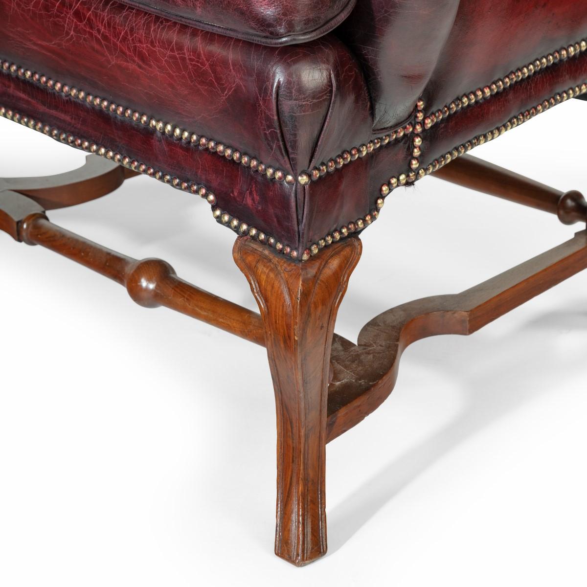 Late 19th Century Pair of George I Style Walnut Wing Arm Chairs