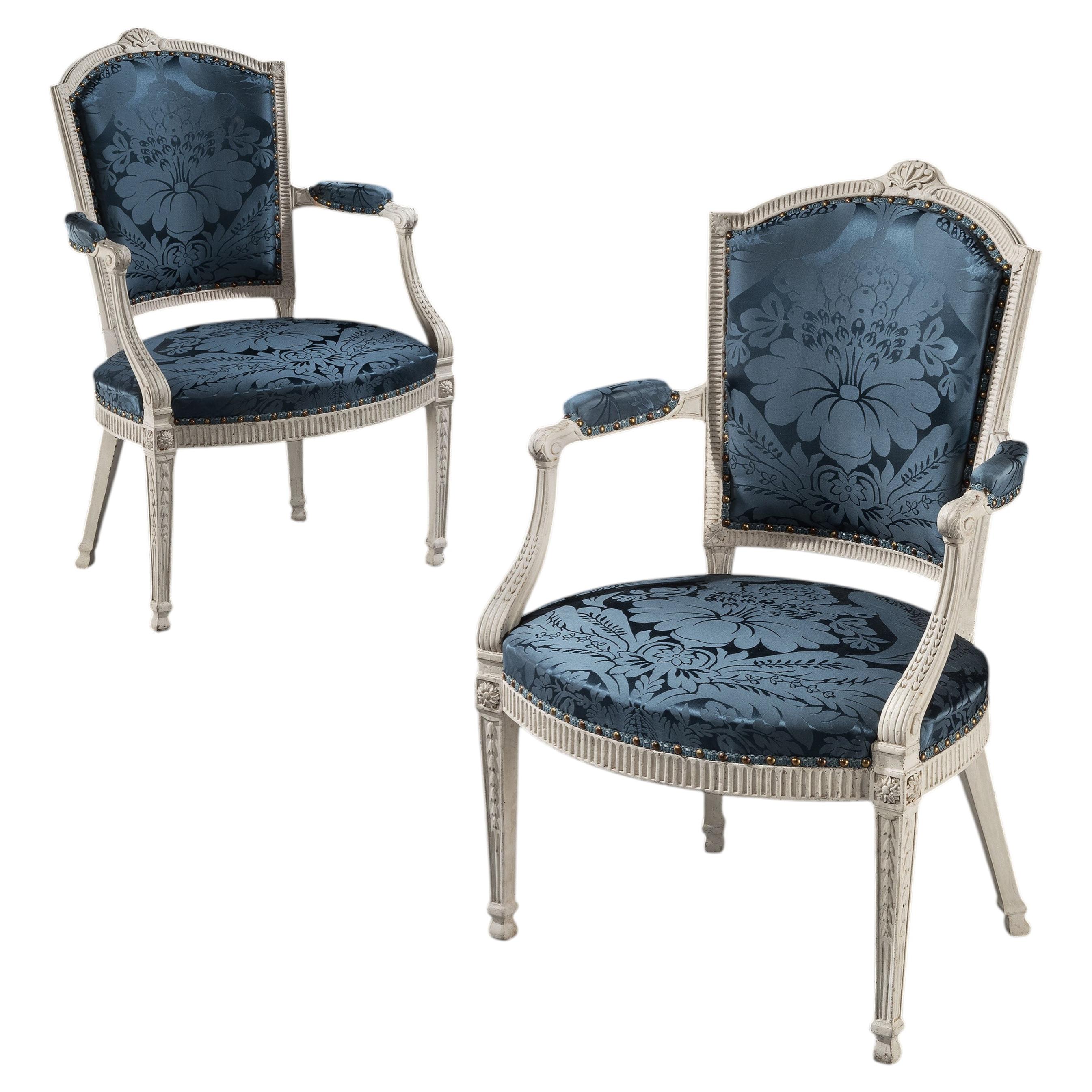 A Pair of George III carved and painted armchairs For Sale