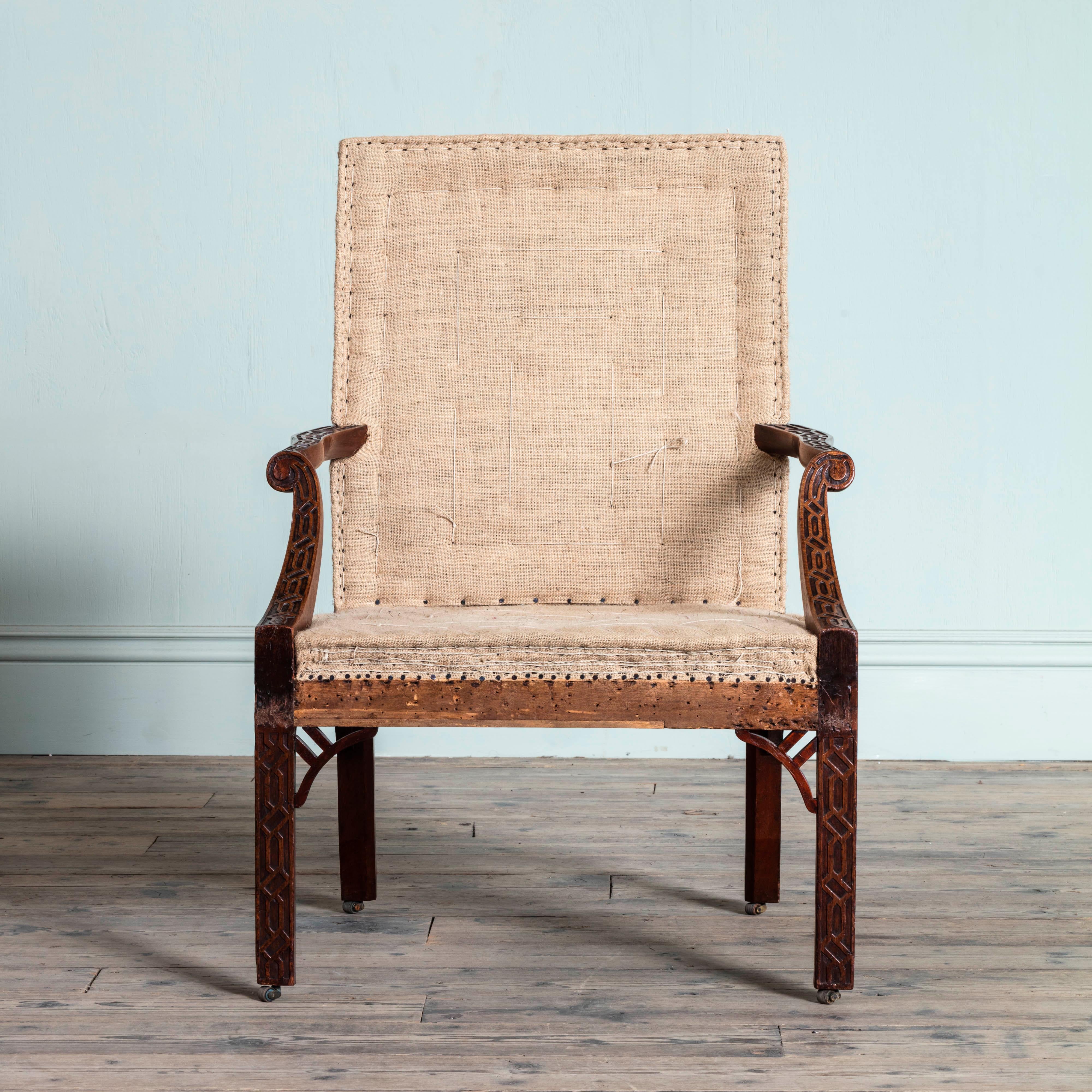 English Pair of George III Mahogany Gainsborough Armchairs and Accompanying Stool For Sale