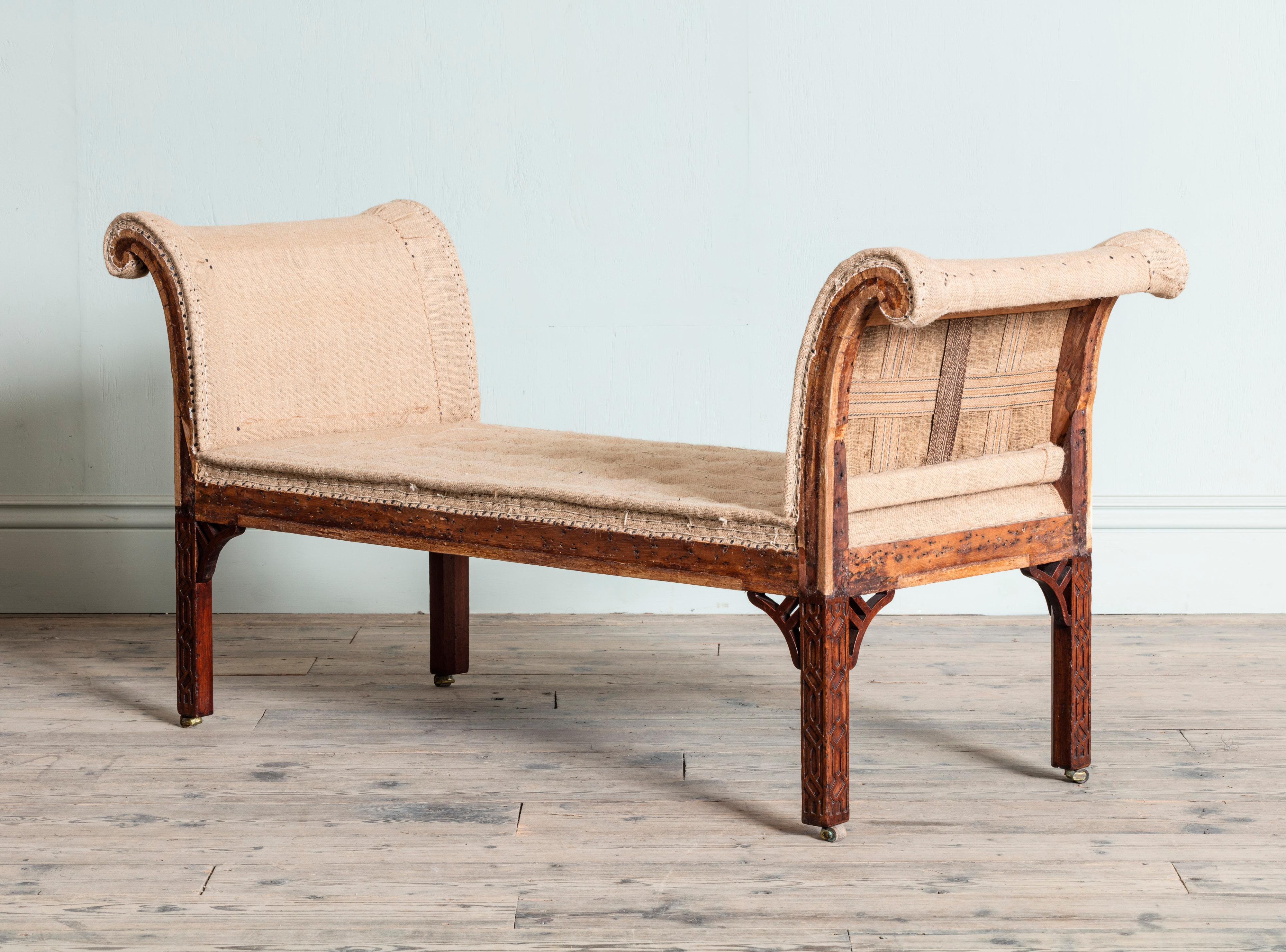 Pair of George III Mahogany Gainsborough Armchairs and Accompanying Stool In Fair Condition For Sale In London, GB