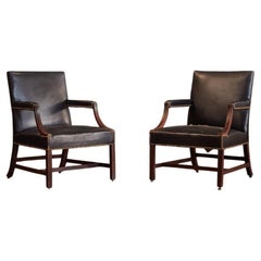 A Pair of George III Mahogany Gainsborough Chairs