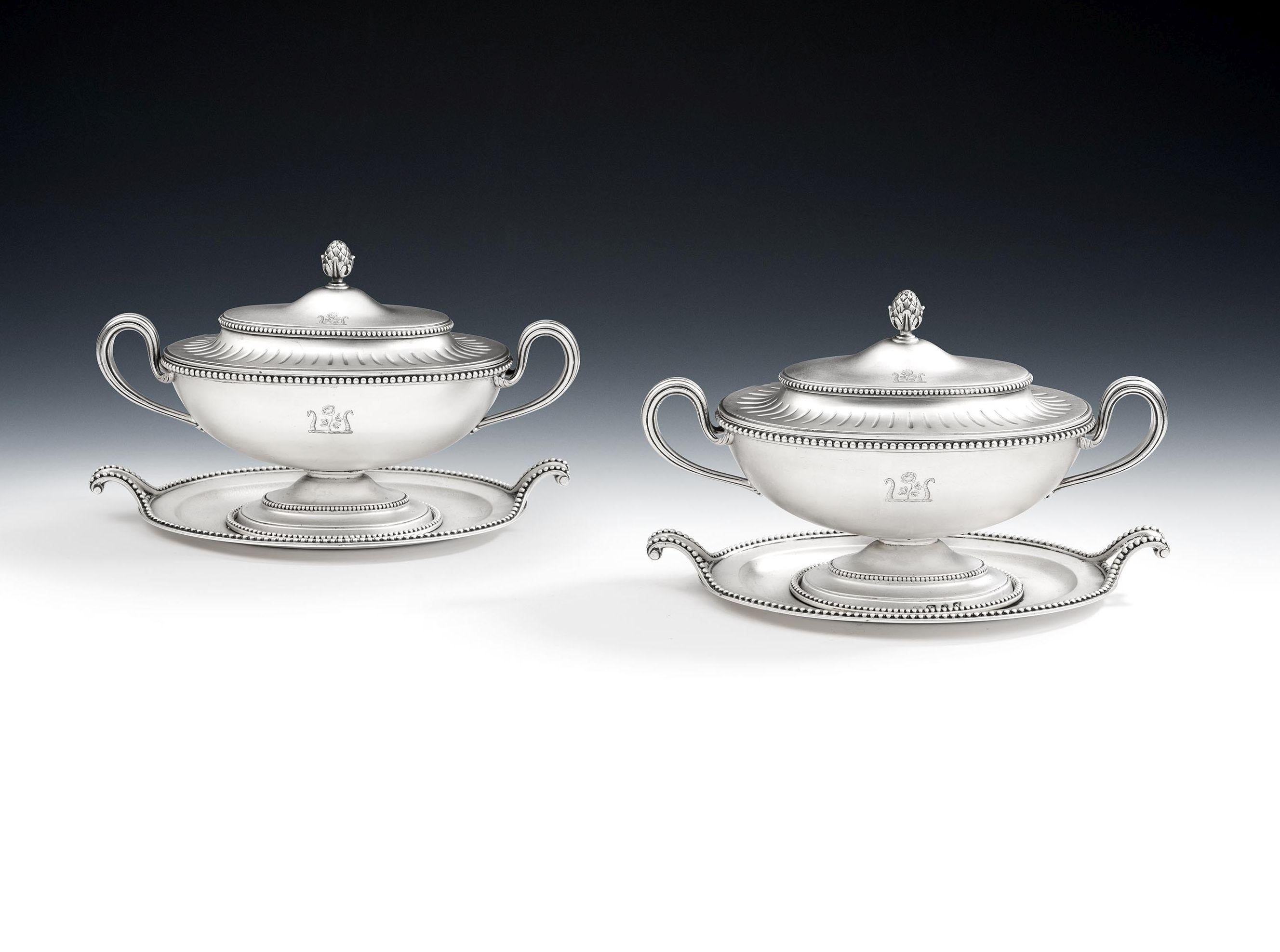 AN IMPORTANT & VERY RARE PAIR OF GEORGE III ANTIQUE STERLING SILVER SAUCE TUREENS, WITH THEIR ORIGINAL STANDS, MADE IN LONDON IN 1773/74 BY SEBASTIAN & JAMES CRESPEL.

The Tureens are modelled in the Neo Classical 