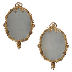 Paire de miroirs en bronze doré George IV