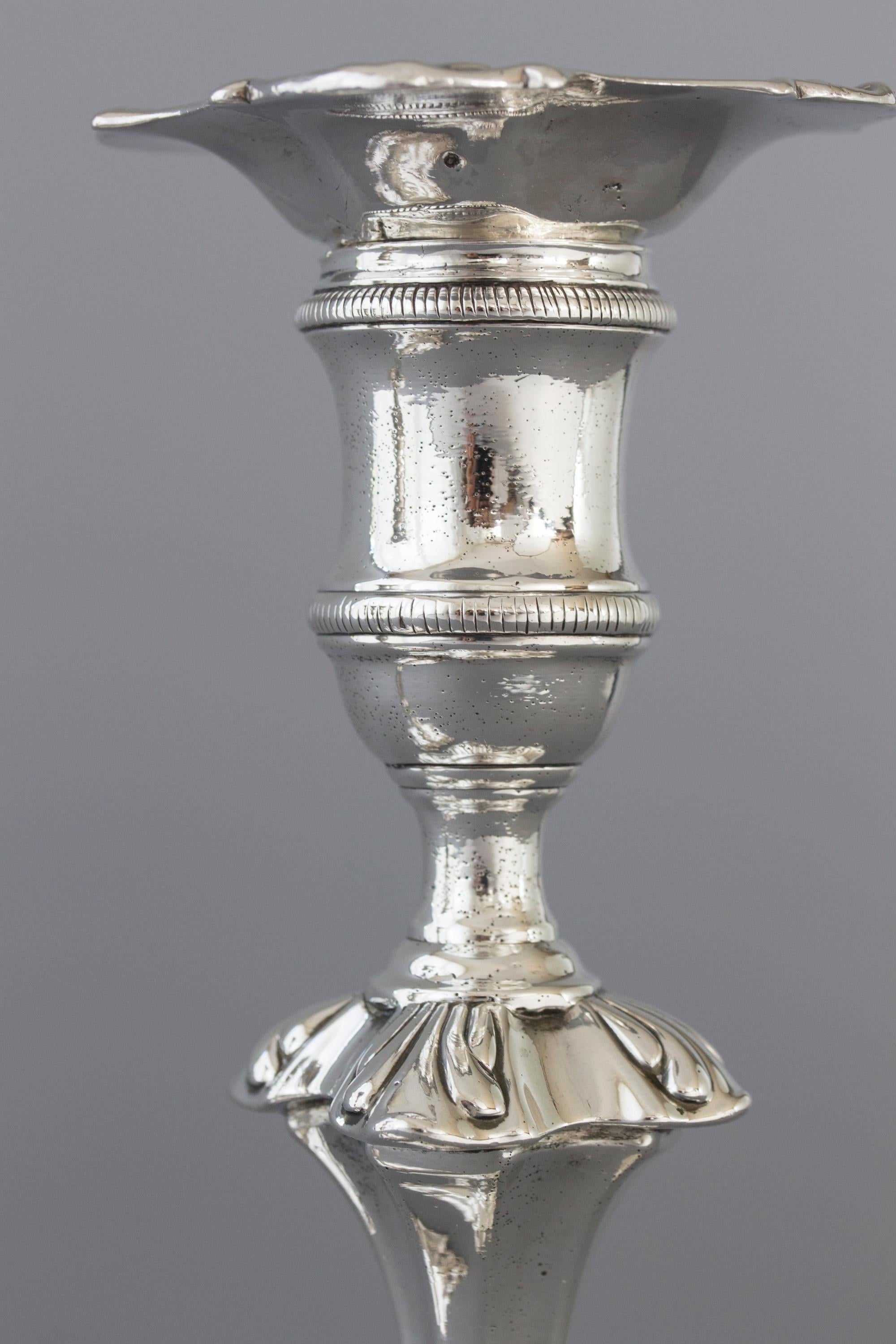 A Pair of Georgian Cast Silver Candlesticks, London 1752 4