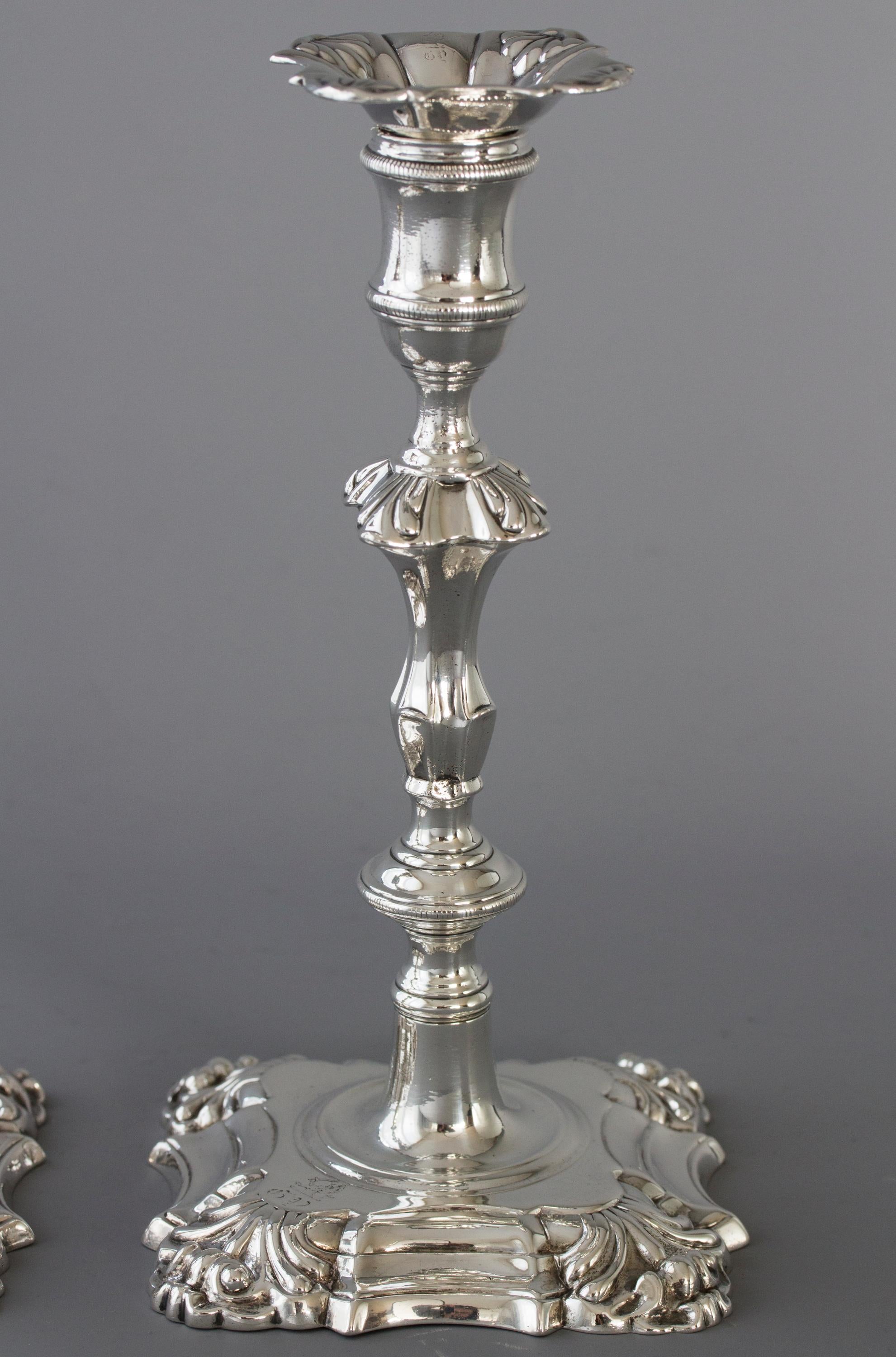 A Pair of Georgian Cast Silver Candlesticks, London 1752 1