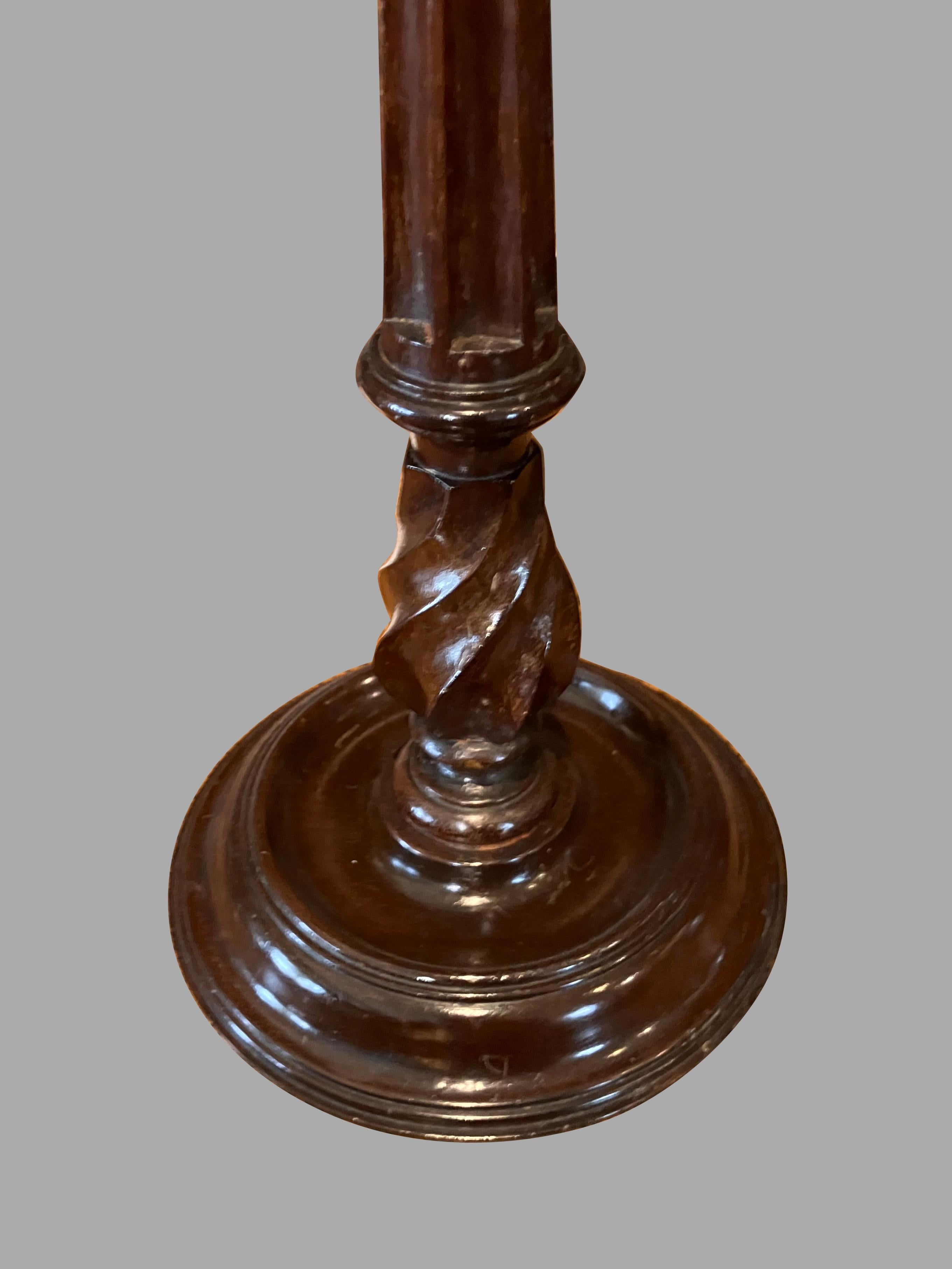 English A Pair of Georgian Style Mahogany and Brass Candlesticks