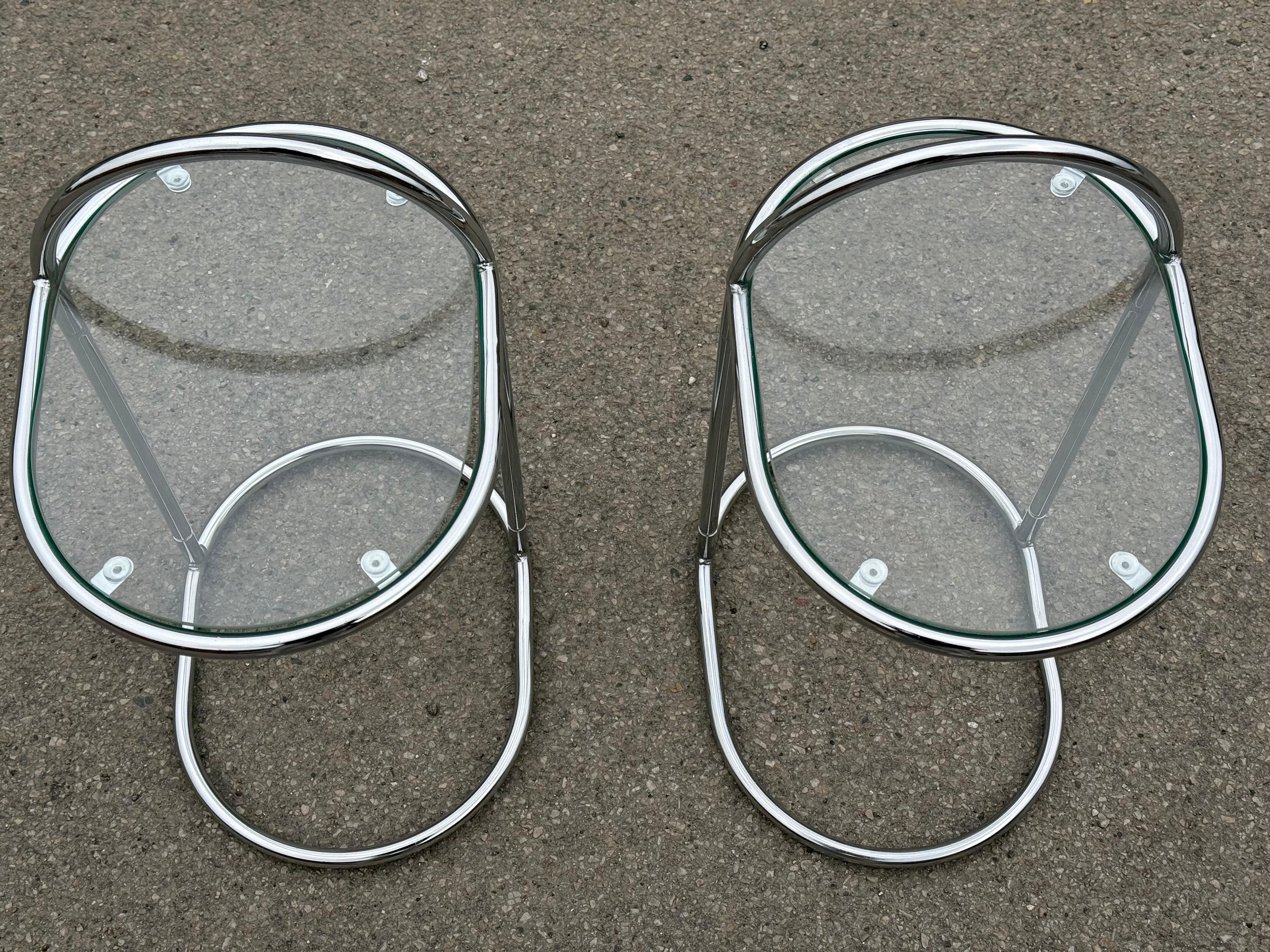 These 1980s Bauhaus-style nightstands exude a cool, clean ambiance, offering both functionality and style with their easy mobility. Rare and hard to find, they feature a subtle elegance and a unique twist that gives them an ultra-modern feel, making
