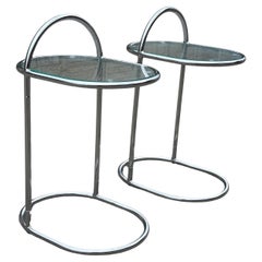 a pair of German 1980´s chrome and glass night stands