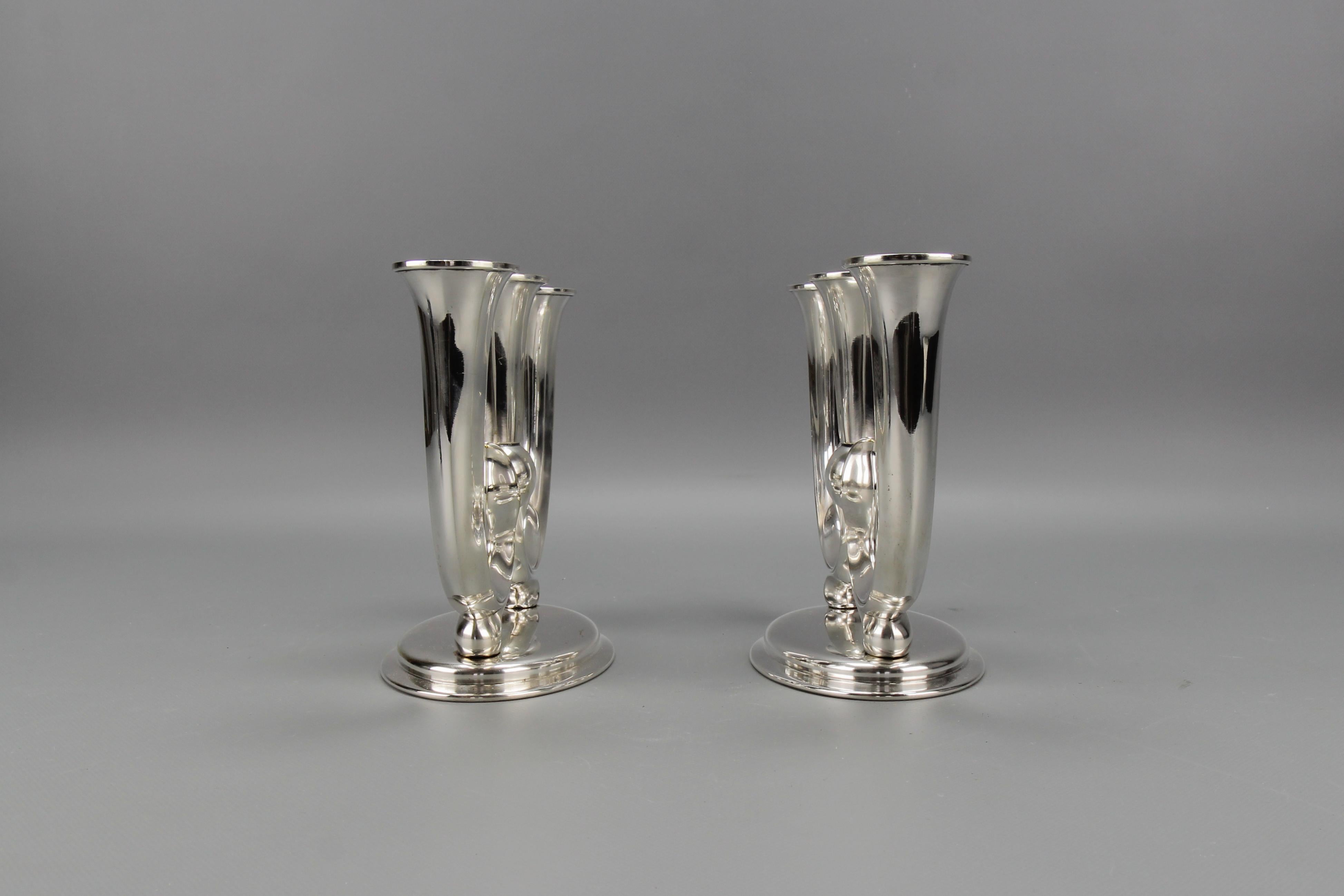 Mid-20th Century Pair of German WMF Art Deco Three-Arm Candle Holders For Sale