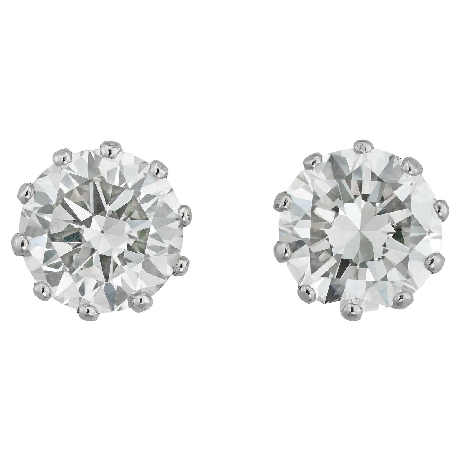 A pair of GIA certified diamond stud earrings