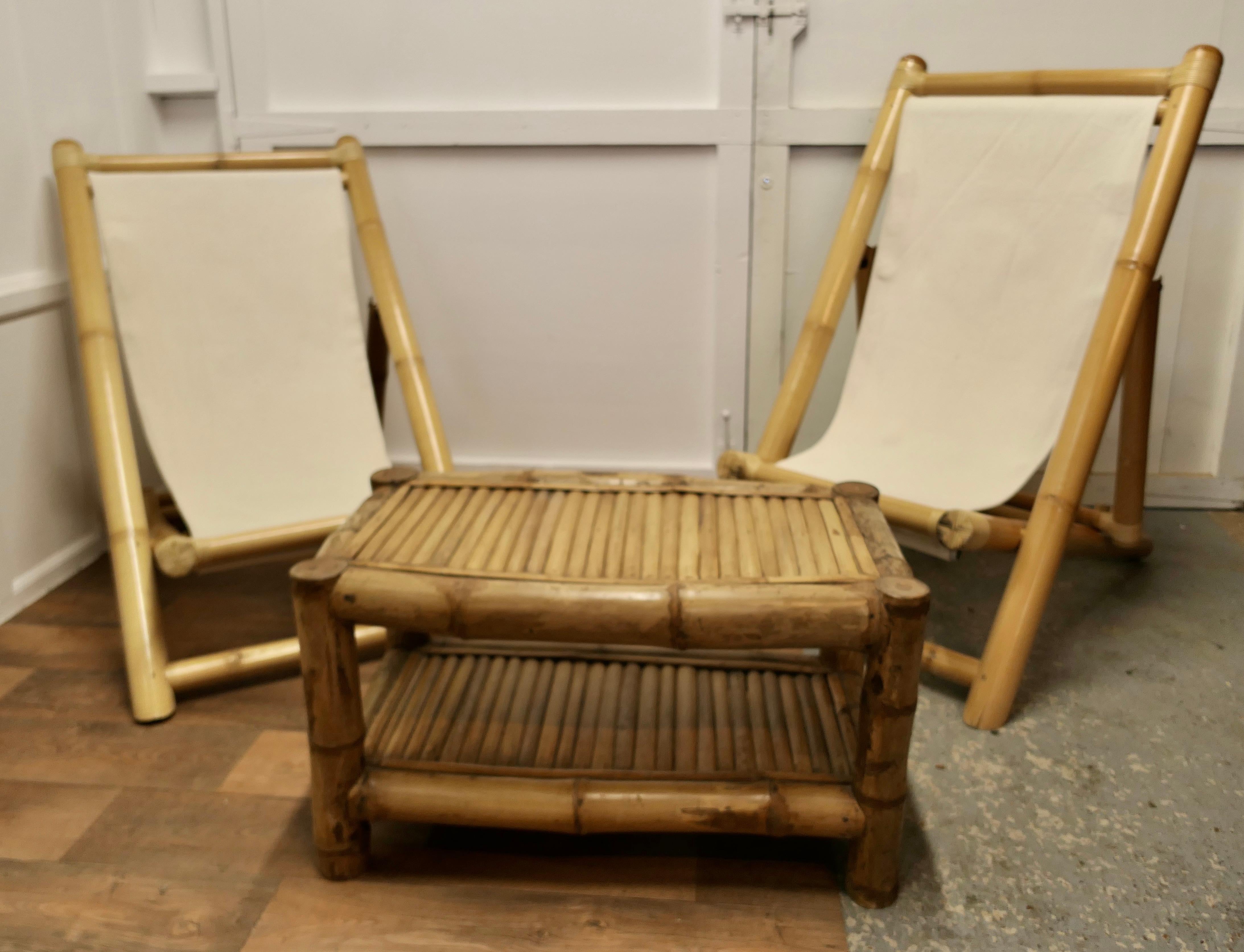 A Pair of Giant Bamboo Deck Chair Set with Coffee Table

These super folding Chairs are meds with giant bamboo and have canvas sail cloth seats, they are in very good condition, we have matched then with a giant bamboo boat shaped coffee table