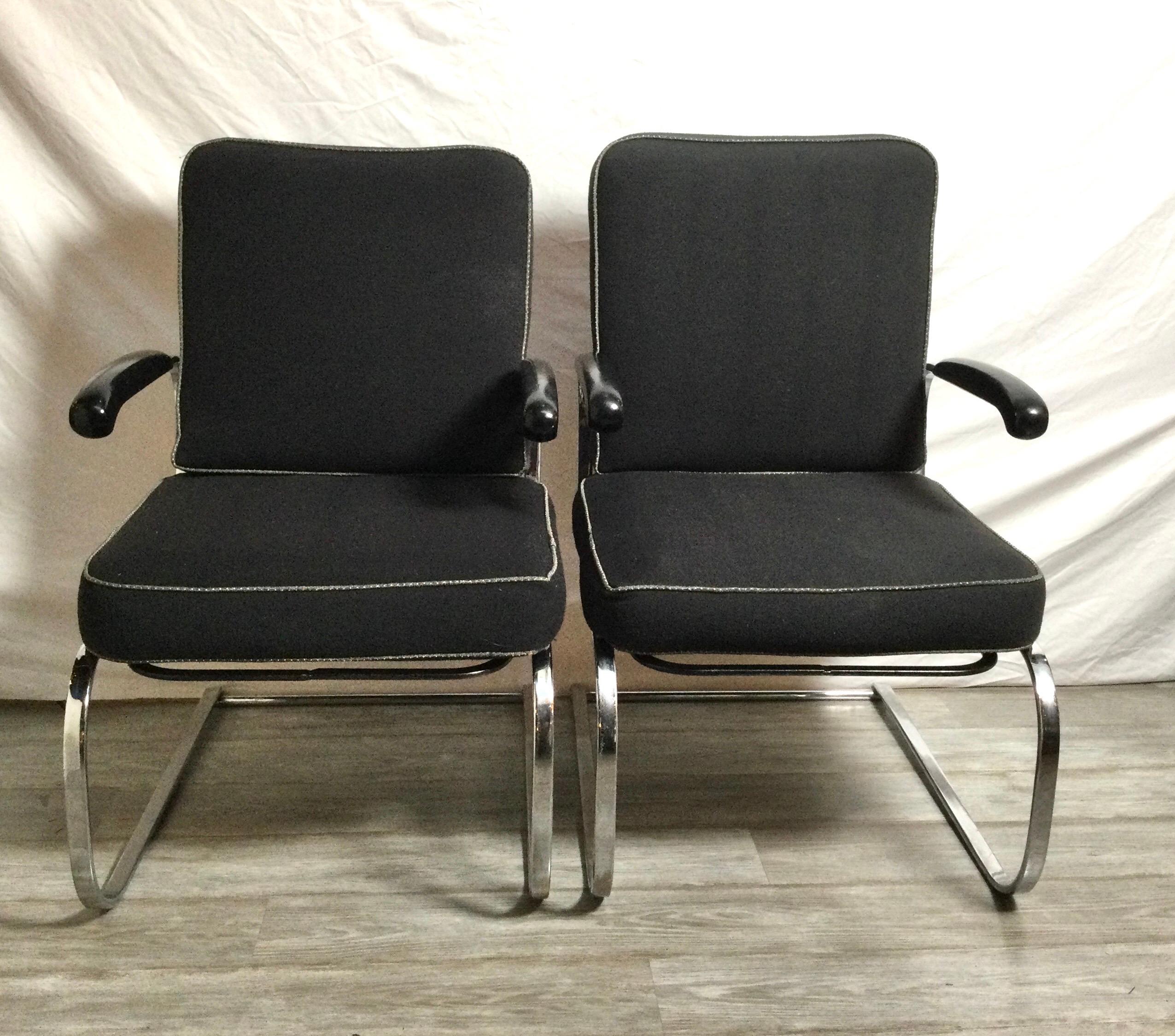 A Pair of 1930’s design chairs for the Troy Sunshade Company and is manufactured from Steel Tube, enameled wood and synthetic fabric.
All original, with some signs of age and use. 

Gilbert Rohde is amongst my very favorite American designers.