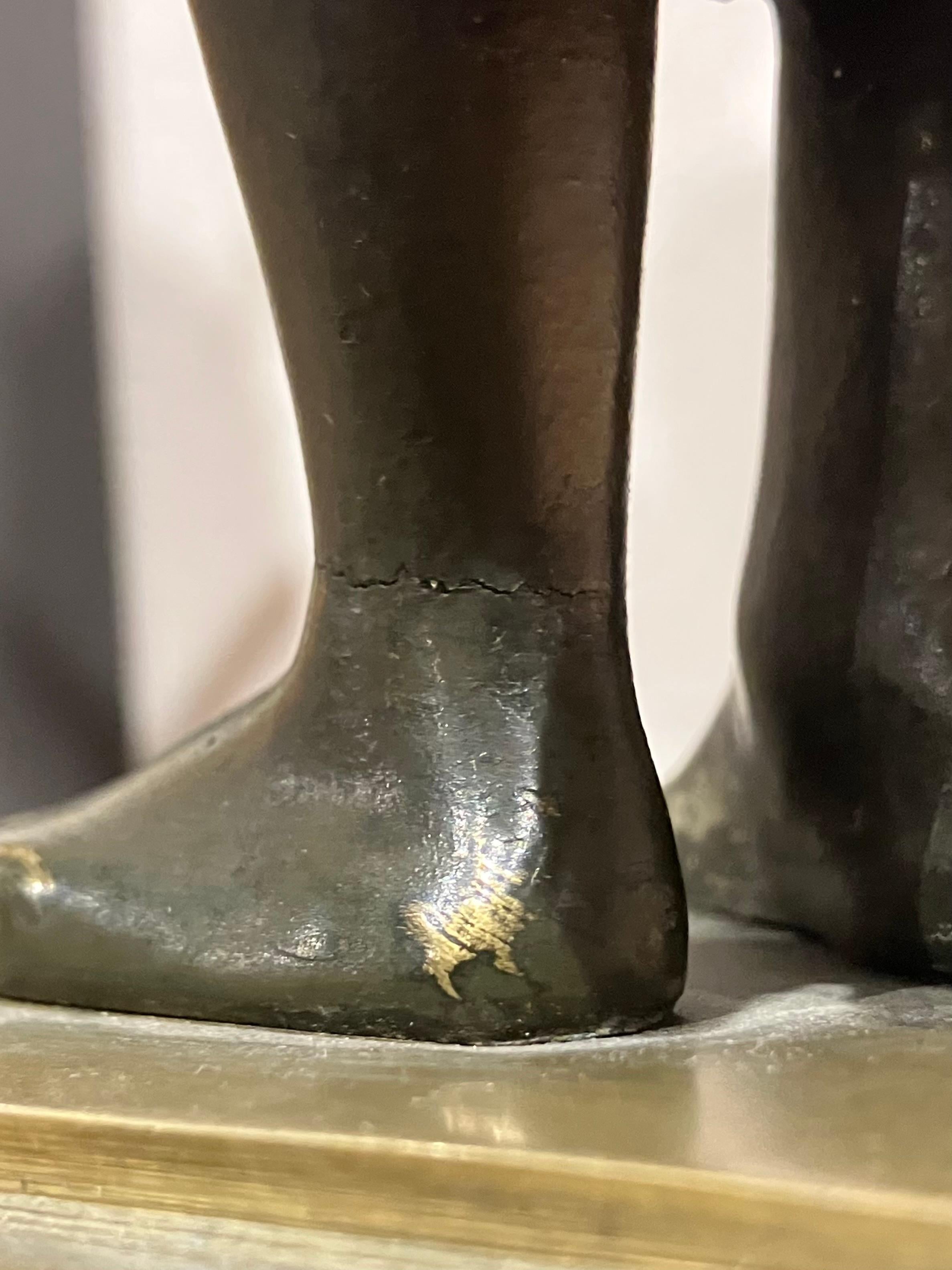 Paire de candélabres en bronze doré et patiné 13