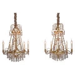 A pair of gilt brass and crystal Gustavian style antique chandeliers