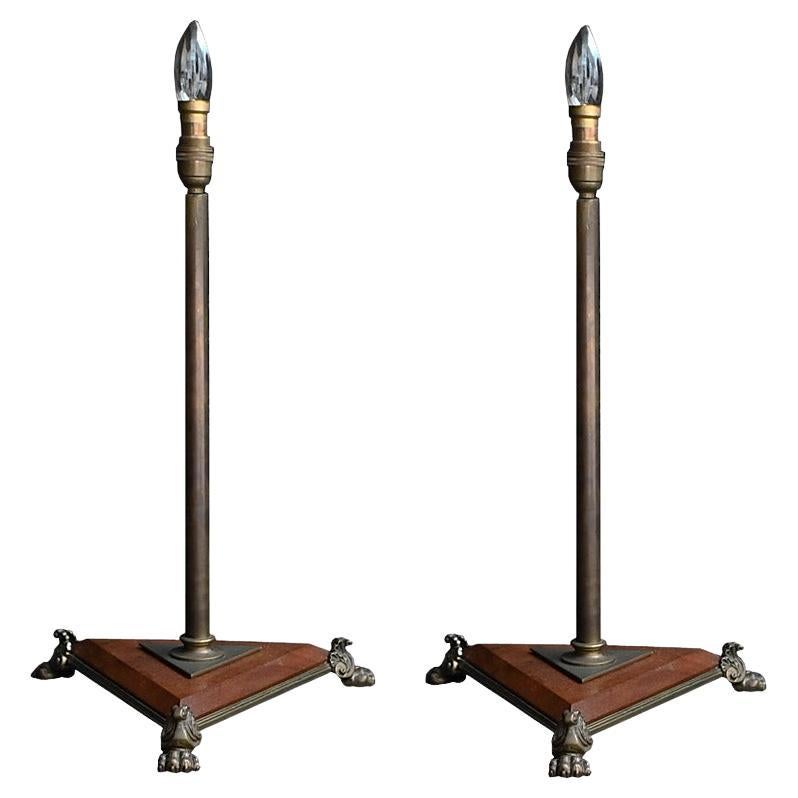 A pair of gilt brass & wood English table lamps.