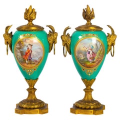 A Pair of Gilt Bronze and Painted Porcelain Vases