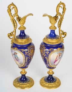 A pair of Gilt Bronze and Royal Blue Porcelain Ewers, 19th Century, Napoleon III