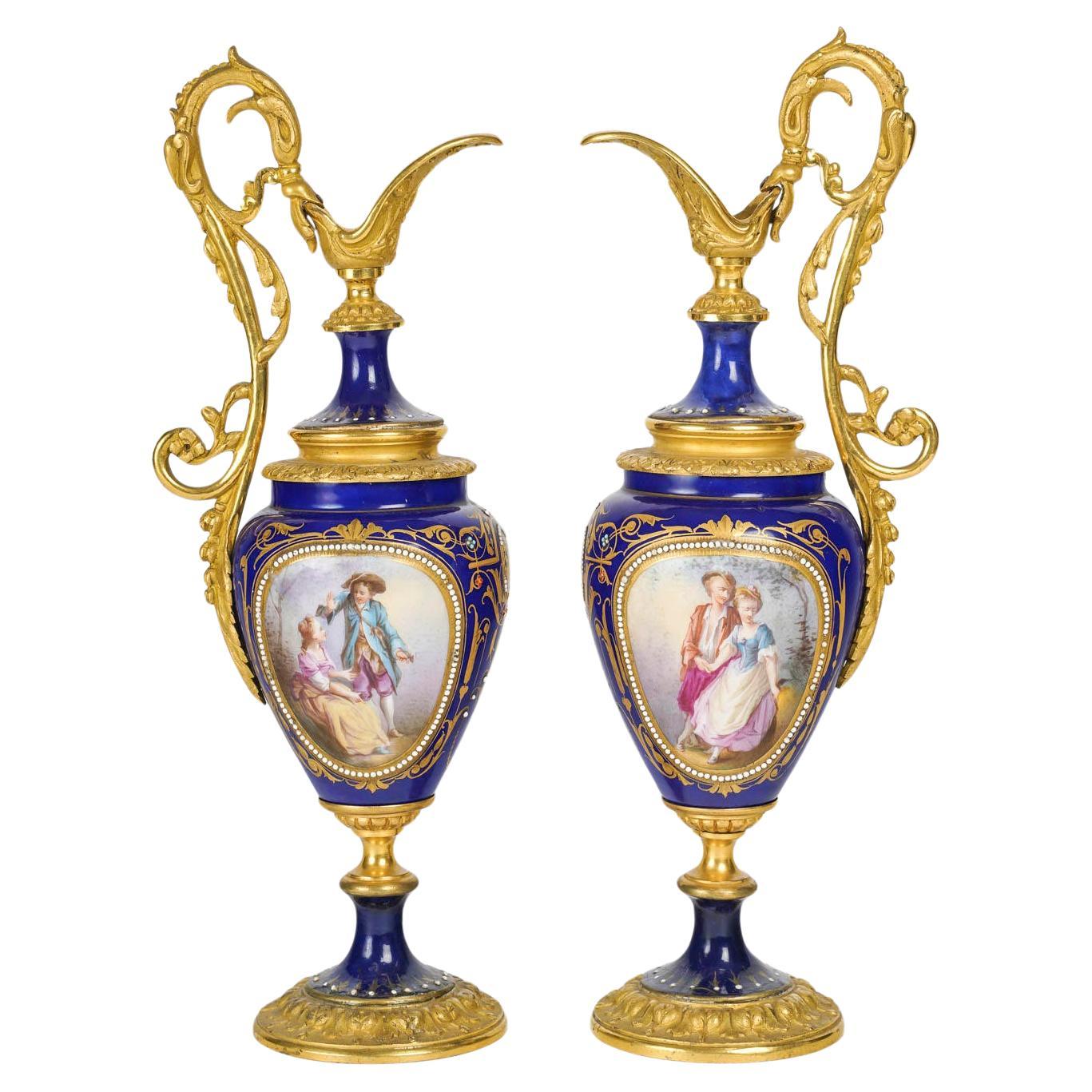 A pair of Gilt Bronze and Royal Blue Porcelain Ewers, 19th Century, Napoleon III For Sale
