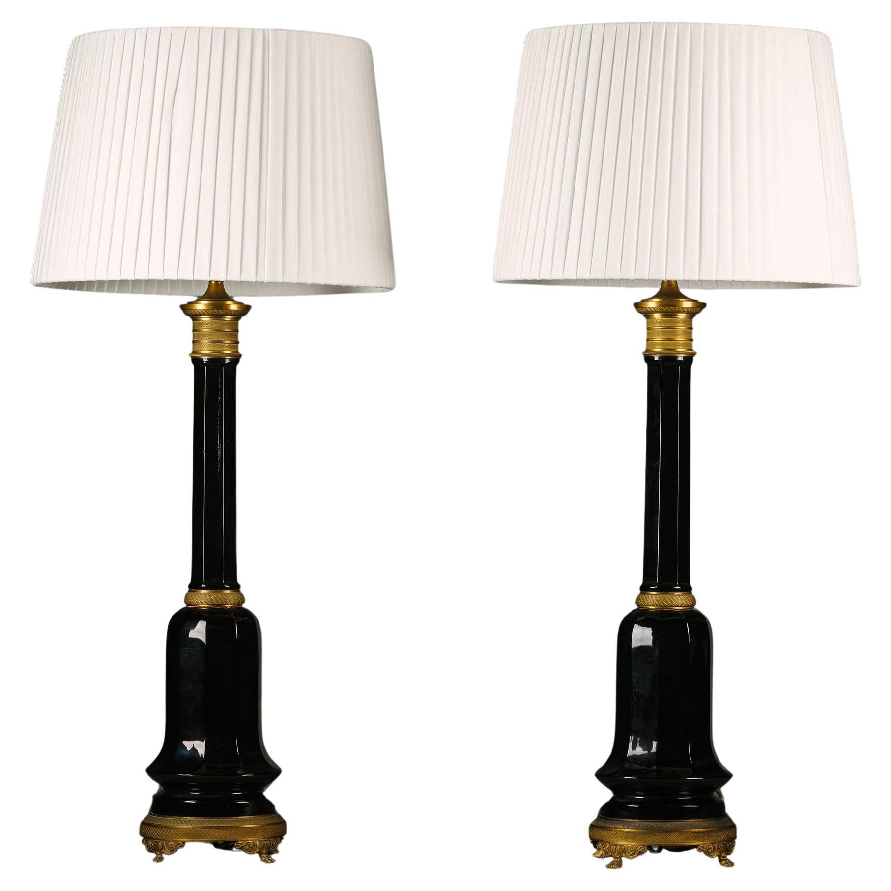 A Pair of Gilt-Bronze and Ruby Glass Table Lamps