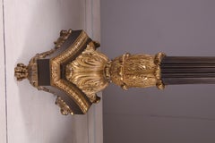 A pair of gilt bronze empire column 19th C table lamps