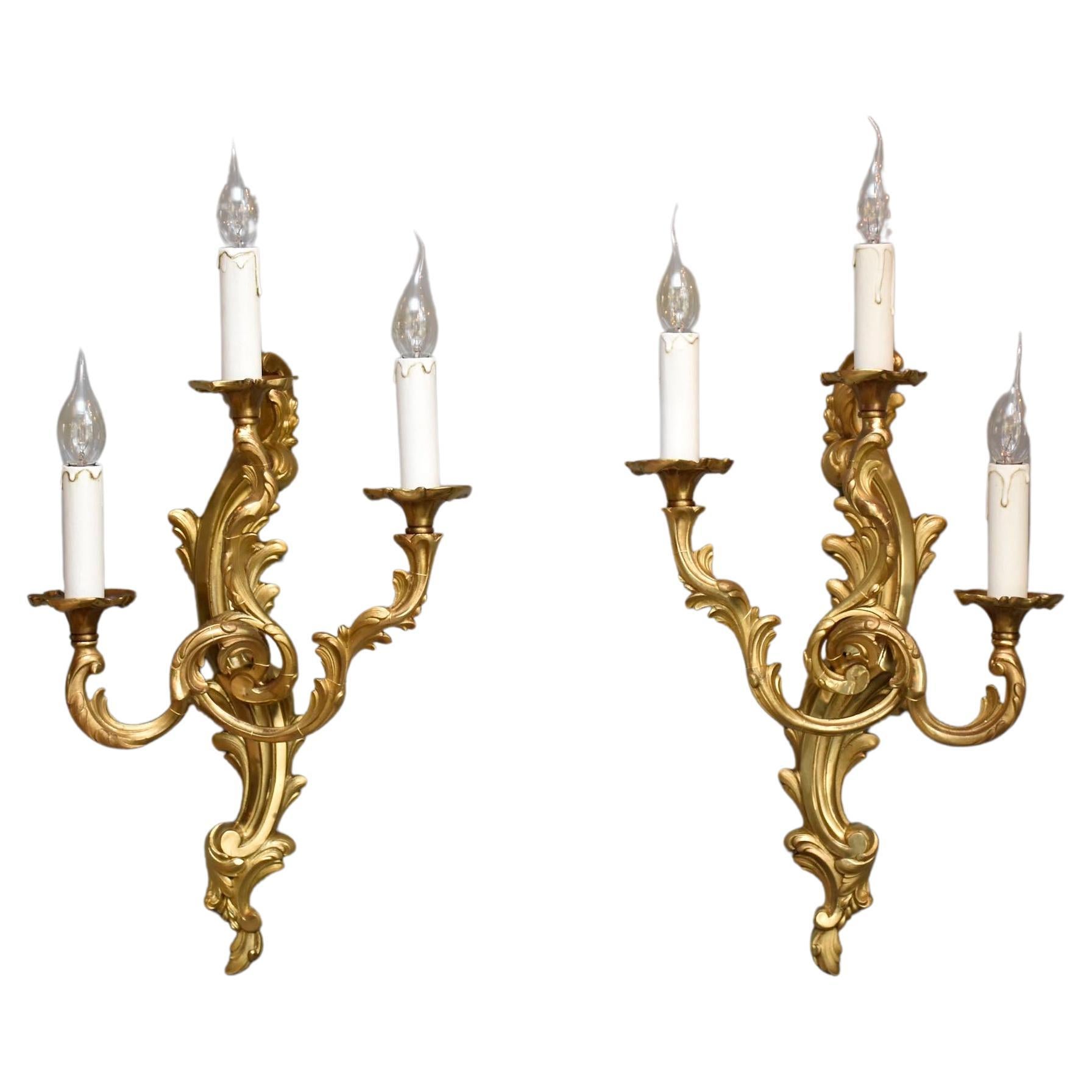 A pair of gilt bronze French wall lights