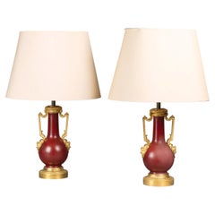 A Pair of Gilt-Bronze Mounted Red Lacquer Vases, Adapted as Table Lamps