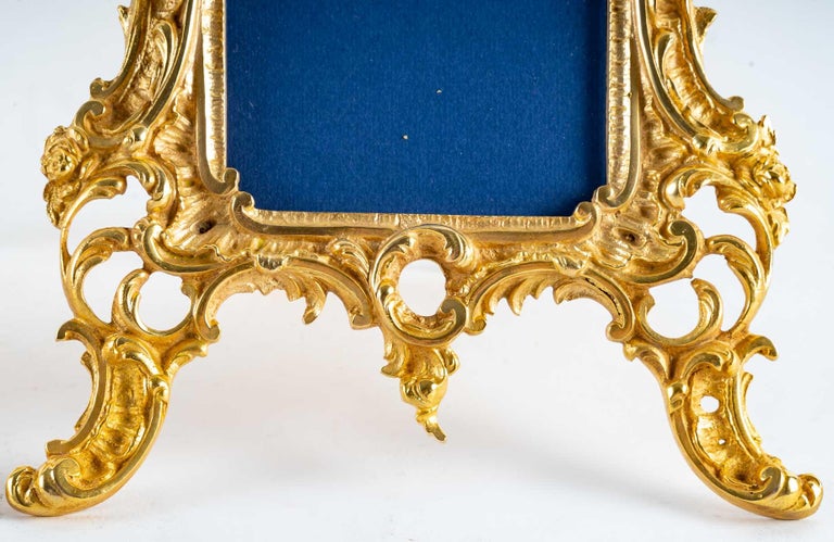 A pair of gilt bronze picture frames, 19th century
Pair of 19th century gilt bronze photo frames, Napoleon III period.
H: 28 cm, W: 19 cm, D: 3 cm.
 