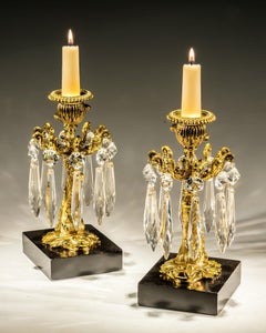 A Pair Of Gilt Lacquer Dolphin Candlesticks