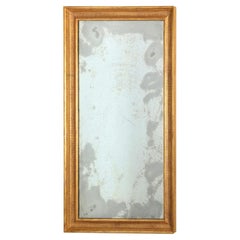 Paire de miroirs en bois doré avec cadre cannelé et verre d'antiquités