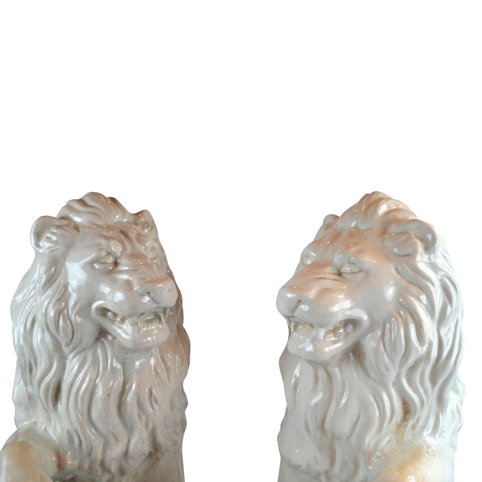 French Pair of Glazed Terracotta Rampant Lion Sculptures