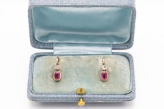 A pair of gold earrings with synthetic rubies and diamonds, Hungary, circa 1920s