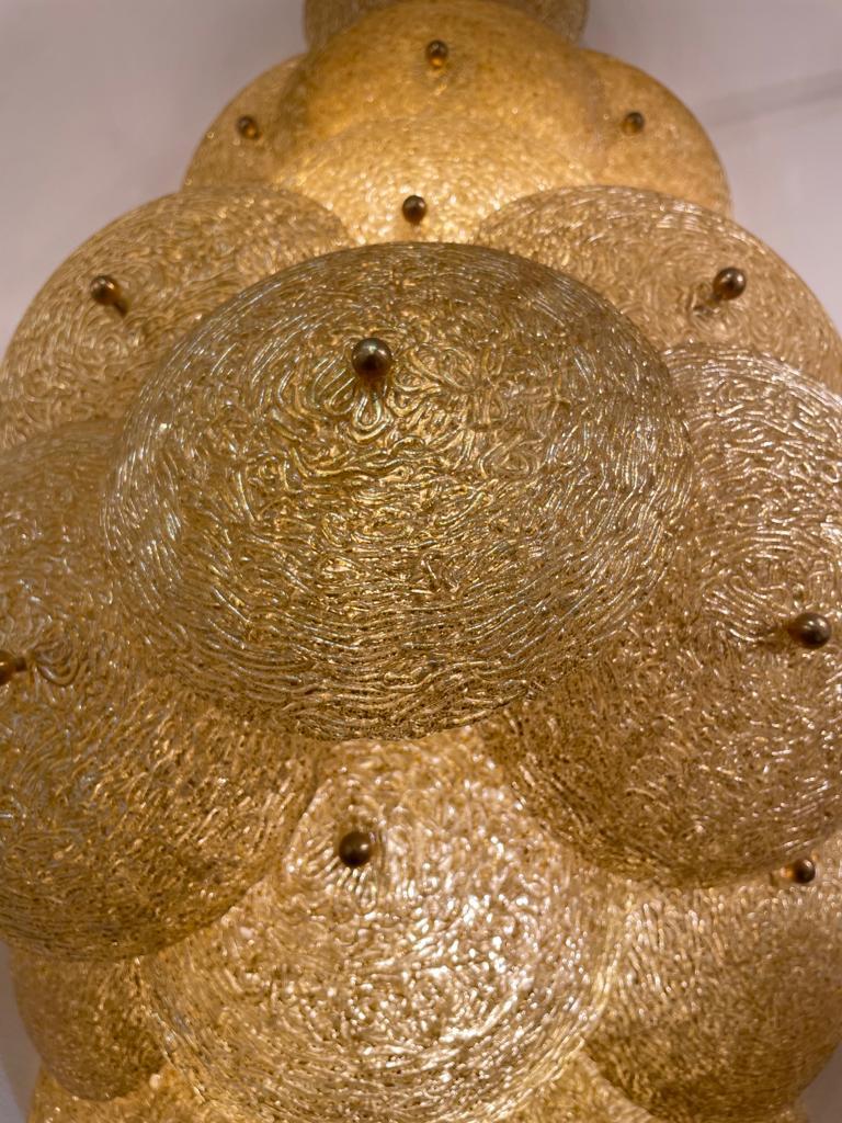 A mesmerising pair of Gold Murano Filigree Glass Discs wall lights, circa 1960s.