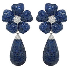 A Pair of Gold, Sapphire and Diamond Earrings